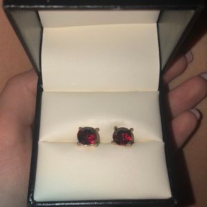 Red stud earrings